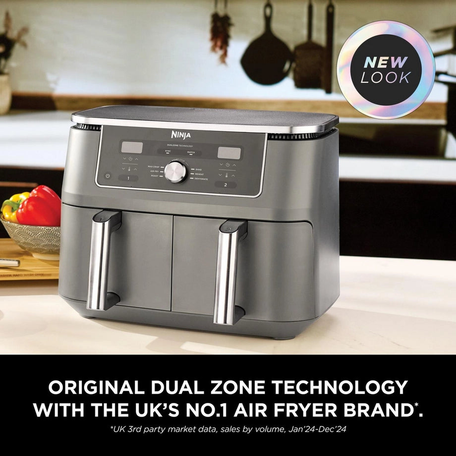 Ninja DZ400UK 9.5L dual zone air fryer in gun metal grey with digital controls and spacious cooking baskets.