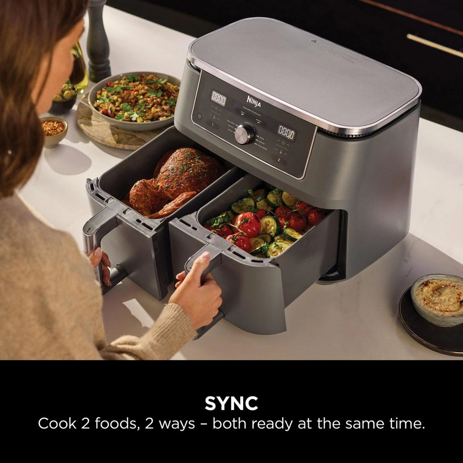 Ninja DZ400UK 9.5L MAX 6-in-1 dual zone air fryer in gun metal grey with digital control panel and large cooking basket.