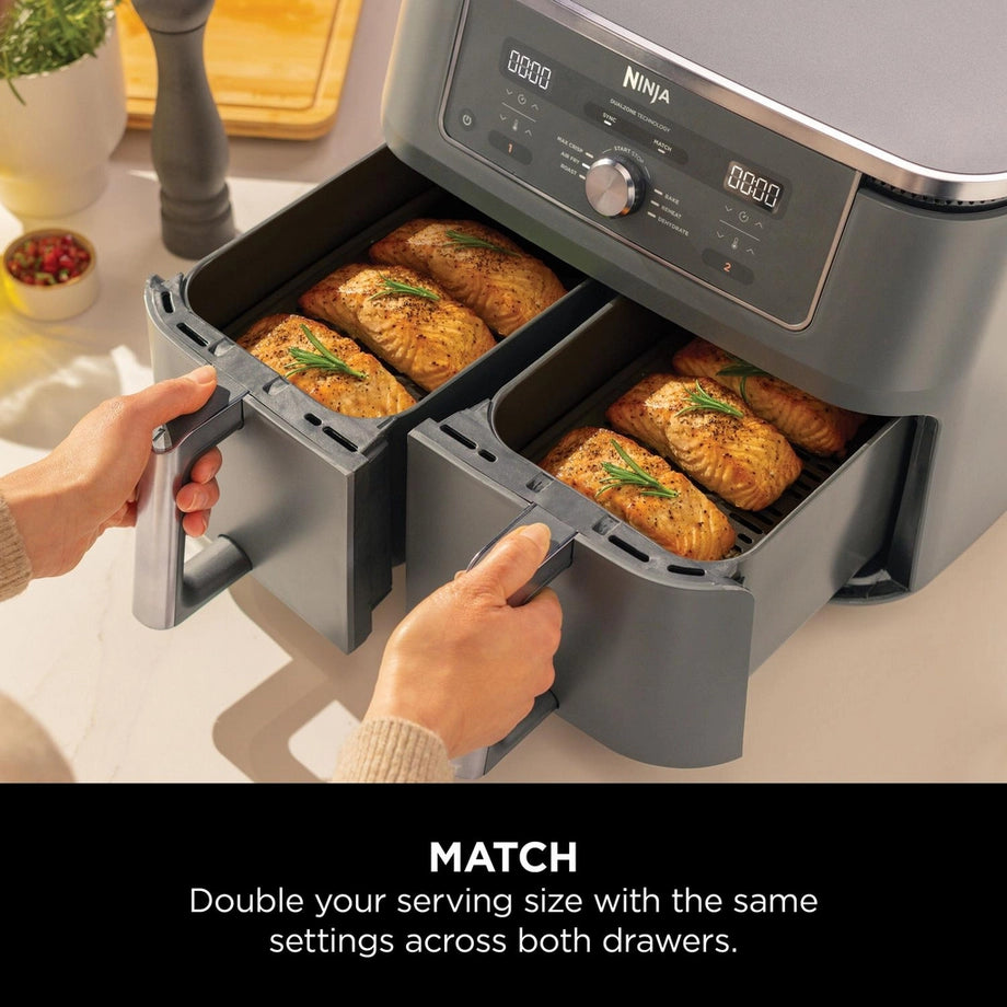 Ninja DZ400UK 9.5L dual zone air fryer in gun metal grey with digital touch controls and two cooking baskets.